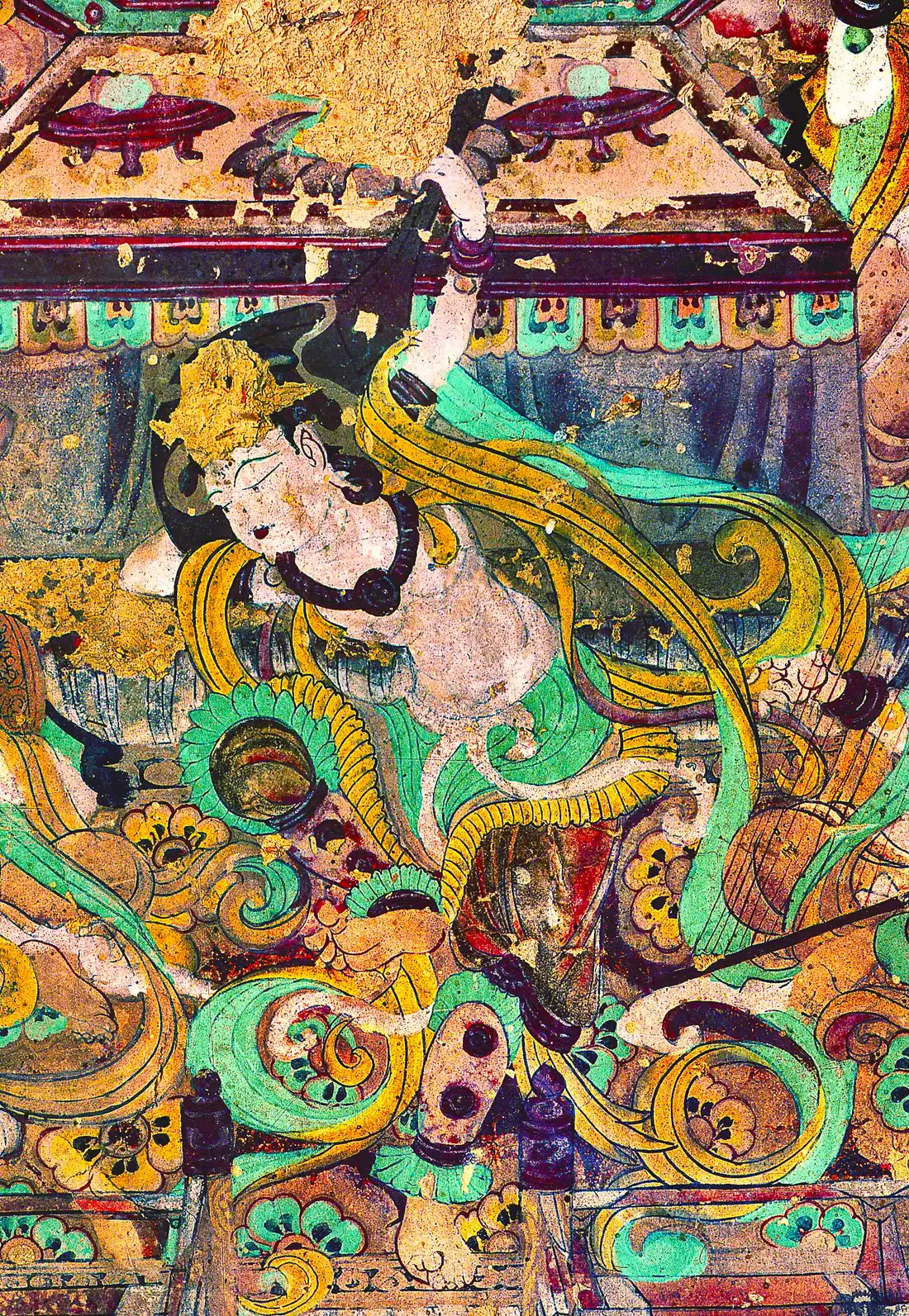 A painted figure playing a pipa, from the Mogao Caves