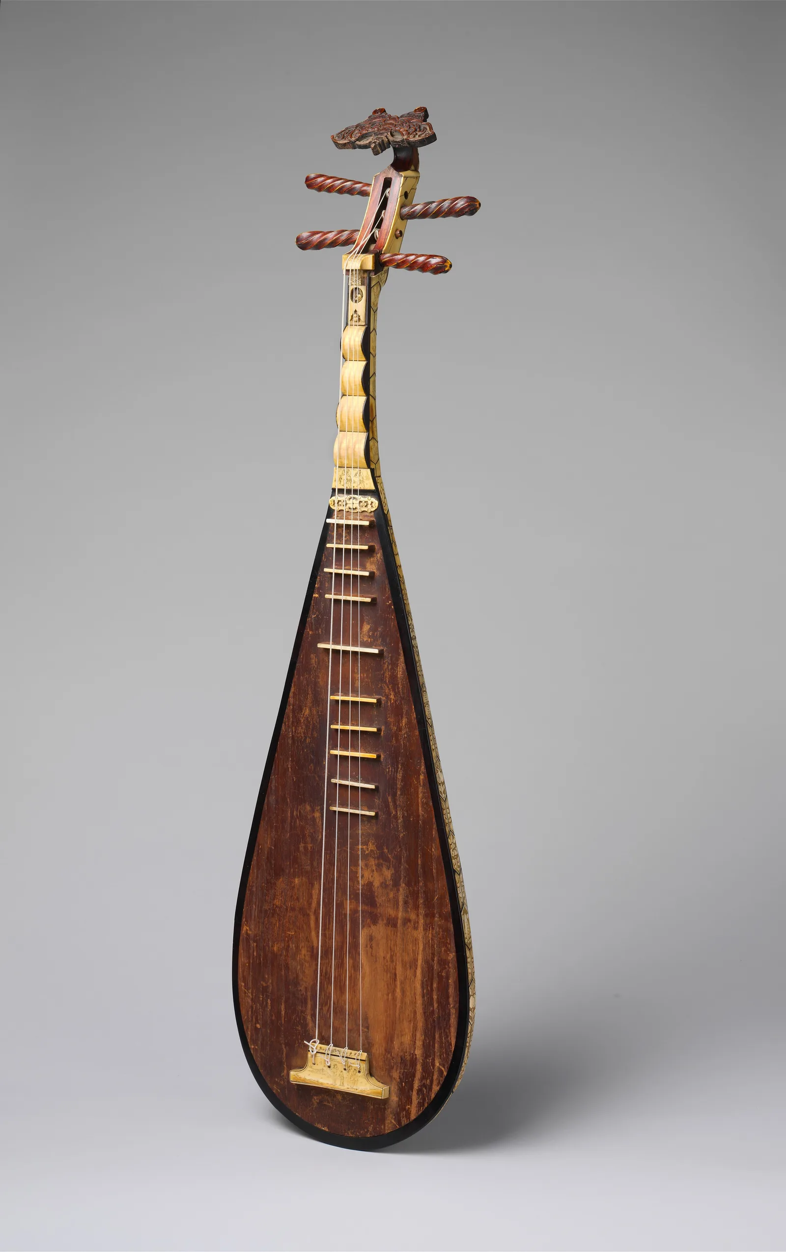 A pipa, a pear-shaped Chinese lute, photographed for a museum catalogue